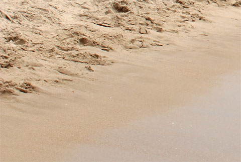 Песок на пляже в Вильяхойсе